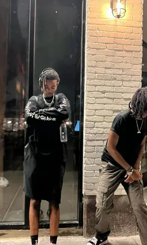 Onlybino wearing Vivienne Westwood backpack