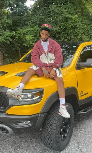 Key Glock wearing Rhude cap