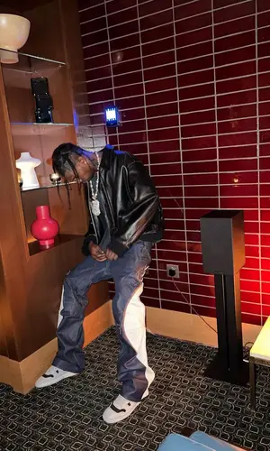 Travis Scott wearing Nike sneakers