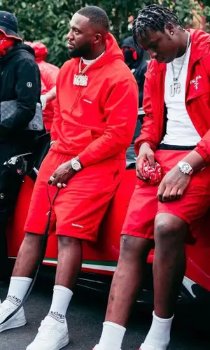 Headie One wearing Balenciaga shorts