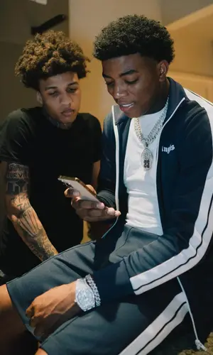Yungeen Ace wearing Palm Angels jacket