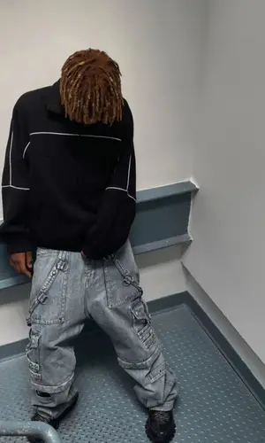 Midwxst wearing Balenciaga jeans