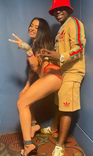 Kodak Black wearing Gucci sweatshirt