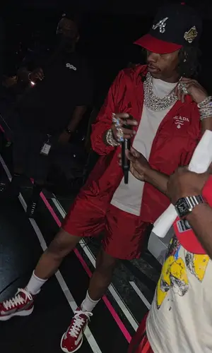 Lil Baby wearing Prada swimwear
