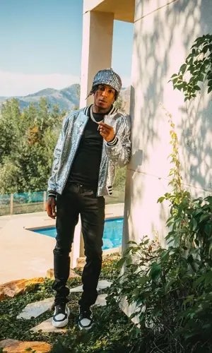 NBA YoungBoy wearing Amiri pants