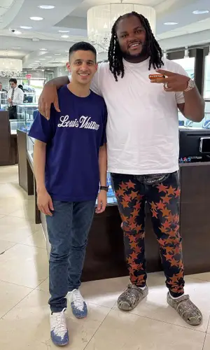 Tee Grizzley wearing Crocs sandal