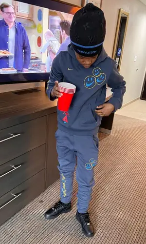 Lil 50 wearing Nike pants