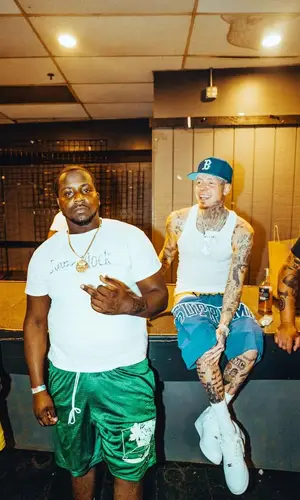 Millyz wearing New Era cap