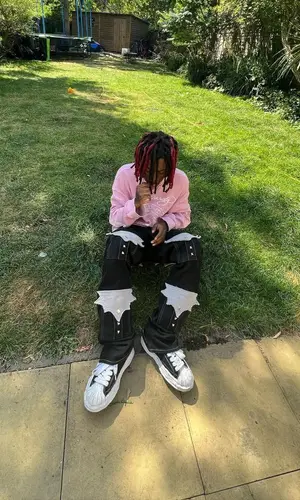 Skaiwater wearing Maison Mihara Yasuhiro sneakers