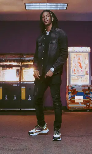 Ja Morant wearing Amiri shirt