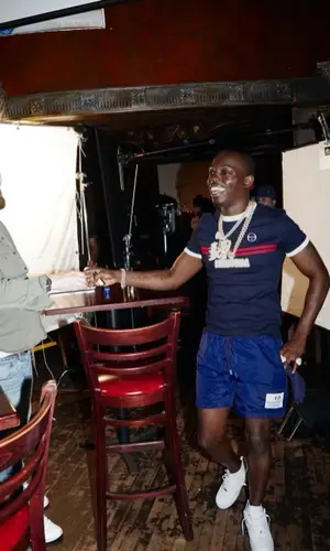 Bobby Shmurda wearing Sergio Tacchini shorts