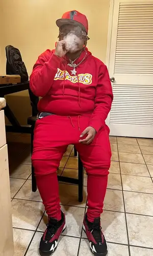 Guap Tarantino wearing Slapwoods hoody