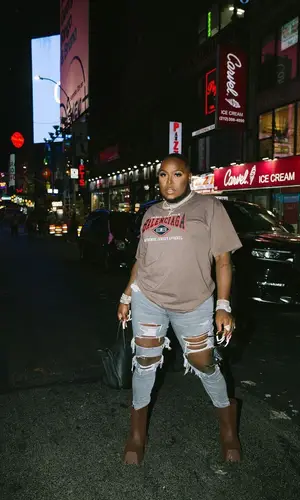 Saucy Santana wearing Balenciaga boots