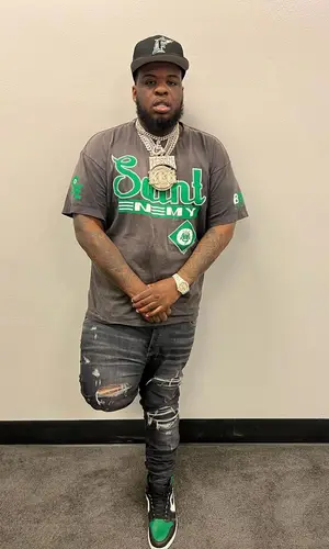 Maxo Kream wearing Saint Michael t-shirt