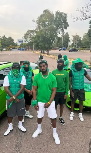 Tion Wayne’s Outfit in Bottega Veneta T-Shirt, Off-White Shorts & Nike Socks (2022)