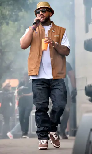 Larry June wearing Midnight Organic jacket