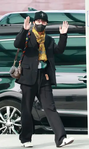 J-Hope wearing Converse sneakers