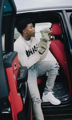 Yungeen Ace wearing Amiri jeans