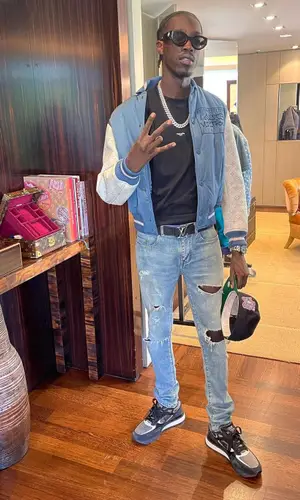 Unknown T wearing Gentle Monster eyewear
