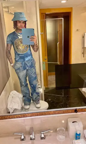 Lil Pump’s Outfit in Versace T-Shirt, Chanel Hat & Fendi (2022)