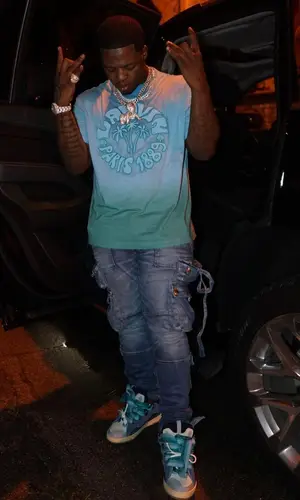Lil Zay Osama wearing Amiri pants