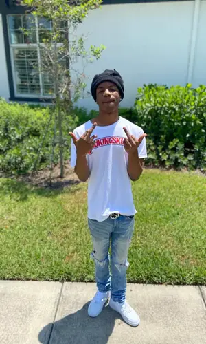 Smokingskul wearing Smokingskul Merch t-shirt