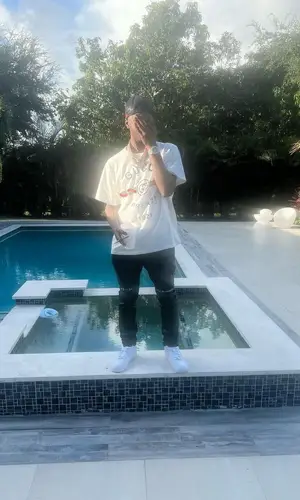 Lil Double 0 wearing Gucci t-shirt