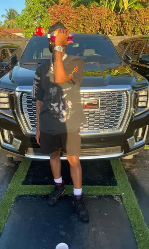 Lil Double 0 wearing Balenciaga shorts