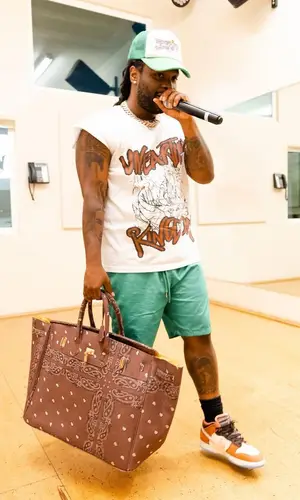Strick wearing Nike sneakers