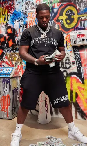 Lil Zay Osama wearing Givenchy shorts