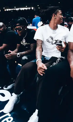 Ja Morant’s Outfit in   Kaws T-Shirt, Fragment Pants & Uniqlo (2022)