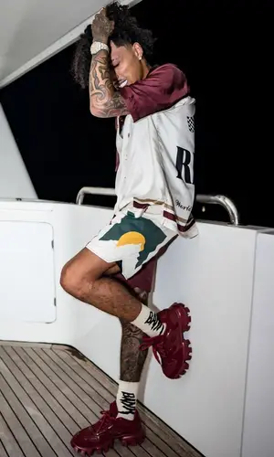 King Cid wearing Rhude shirt