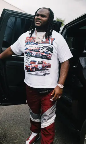 Tee Grizzley wearing Jordan sneakers