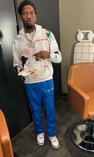 BlocBoy JB wearing Palm Angels pants