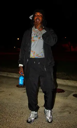 EST Gee wearing Givenchy pants