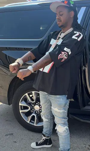 Babyface Ray wearing Amiri jeans