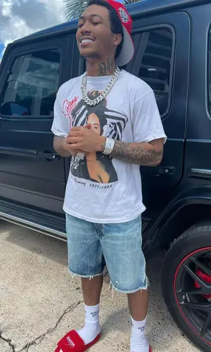 Lil Meech wearing Balenciaga sandal