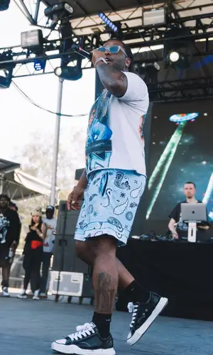 Strick wearing Maison Mihara Yasuhiro sneakers