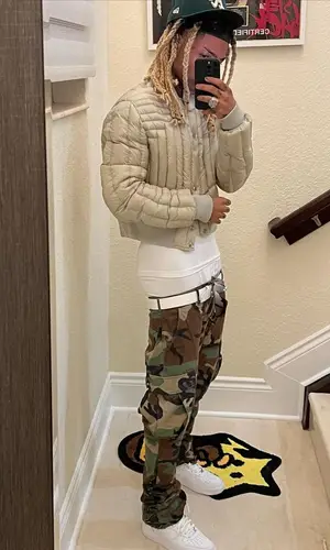 Ronny J’s Outfit in Rick Owens Jacket, Balenciaga Belt & New Era Cap (2022)