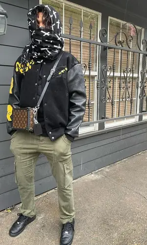 Snot’s Outfit in Ryan Knew Jacket, Nike Sneakers & Louis Vuitton Bag (2022)