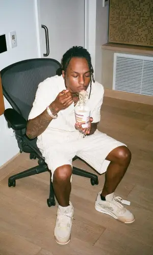 Rich The Kid wearing Fendi shorts