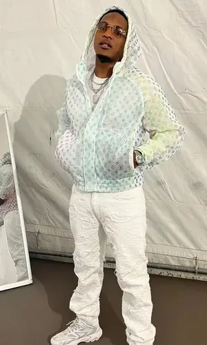 Niska wearing Givenchy jeans