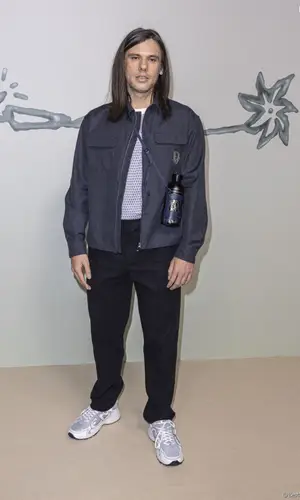 OrelSan wearing Dior pants