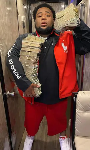 Rod Wave wearing Ralph Lauren shirt