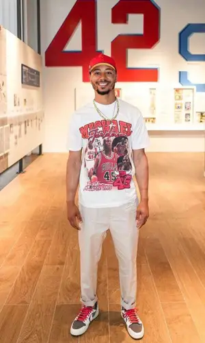 Mookie Betts wearing Omnipresent t-shirt
