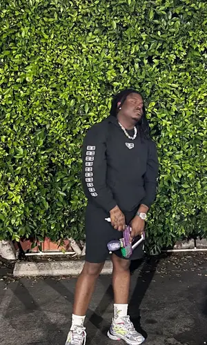 Lucki wearing Balenciaga shorts