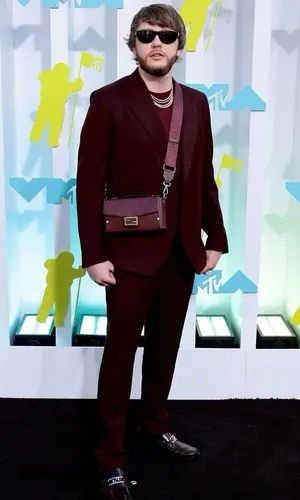 Murda Beatz wearing Fendi bag