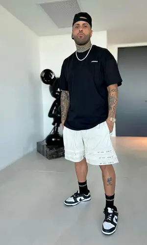 Nicky Jam’s Outfit in Bristol Studio Shorts, Nike Sneakers & Balenciaga Socks (2022)