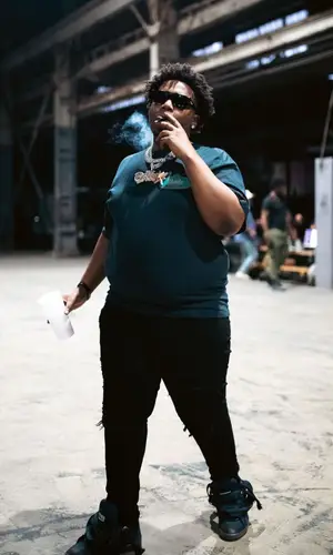 Big30 wearing Amiri jeans