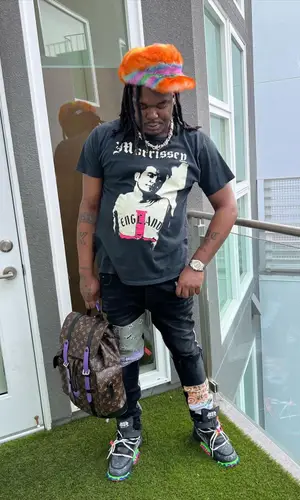 Lucki’s Outfit in Made Worn T-Shirt, Amiri Jeans & Marni Hat (2022)